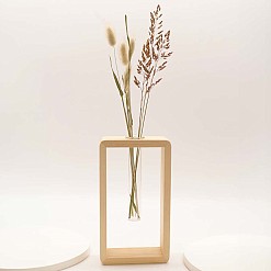 Vase minimaliste en bois avec tube de laboratoire