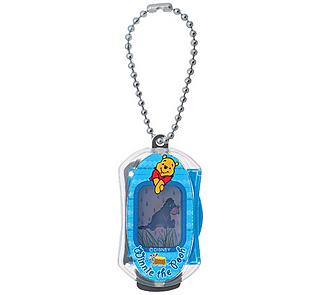 A Winnie the Pooh key chain that discharges static electricity