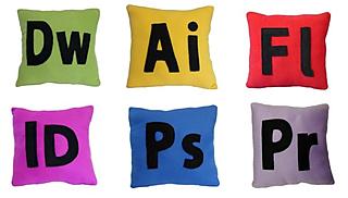Pillows featuring the icons computer applications such as Illustrator, Dreamweaver, Flash...