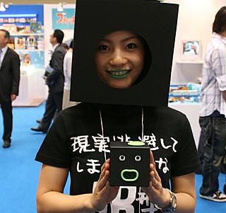A girl disguised as ClockMan at an event