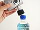 It's as simple as screwing it on over the bottle cap!