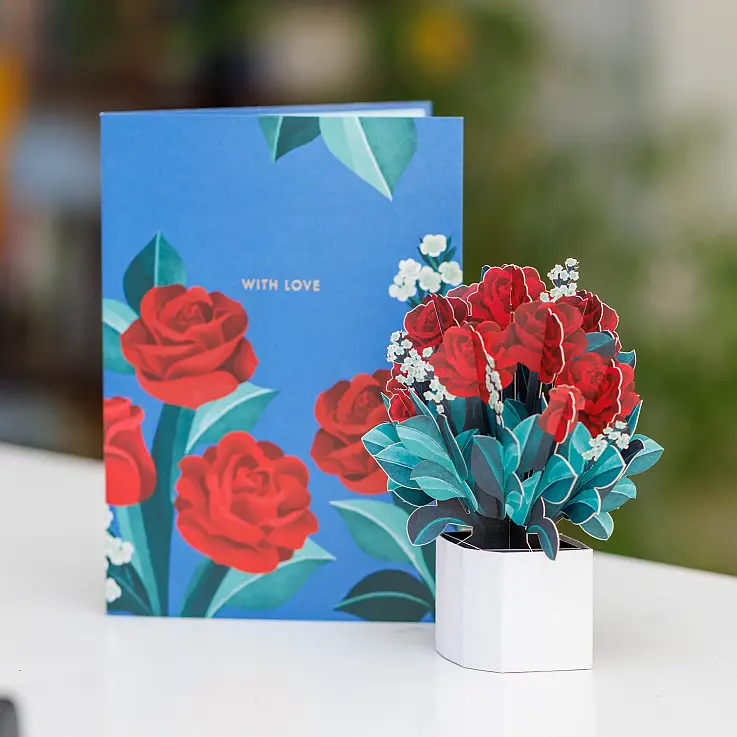 Le bouquet mesure 13,6 cm de haut.